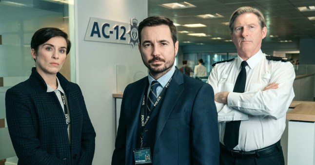 Martin Compston, Vicky McClure and Adrian Dunbar in Line of Duty. They are all in smart office attire and look stern