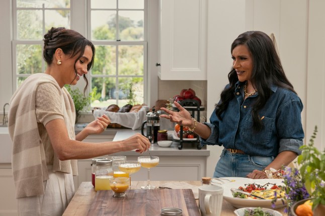 Meghan, Duchess of Sussex, left, and Mindy Kaling in a scene from With Love, Meghan