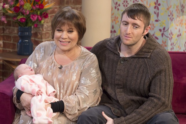 Editorial use only Mandatory Credit: Photo by Ken McKay/REX/Shutterstock (3479145m) Tina Malone with baby daughter Flame and her partner Paul Chase 'This Morning' TV Programme, London, Britain - 06 Jan 2014 TINA MALONE - A new year and a new baby! Mum at 50, Tina Malone introduces us to her latest family member - her daughter, Flame. Tina and her partner, Paul, tell us how fertility treatment worked for them.