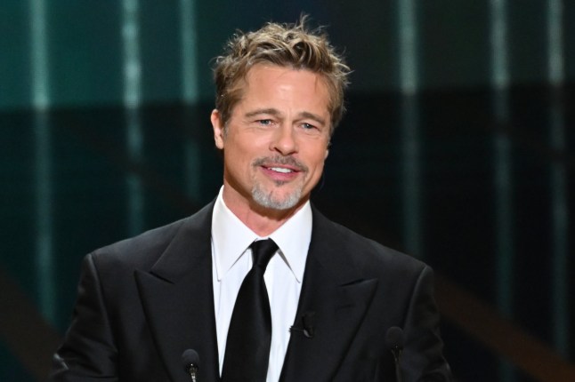 PARIS, FRANCE - FEBRUARY 24: Brad Pitt onstage while David Fincher receives the "Honorary C??sar Award" during the 48th Cesar Film Awards at L'Olympia on February 24, 2023 in Paris, France. (Photo by Stephane Cardinale - Corbis/Corbis via Getty Images)