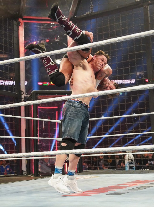 TORONTO, CANADA - MARCH 1: John Cena delivering an Attitude Adjustment to CM Punk during WWE Elimination Chamber at Rogers Centre on March 1, 2025 in Toronto, Canada. (Photo by Georgiana Dallas/WWE via Getty Images)