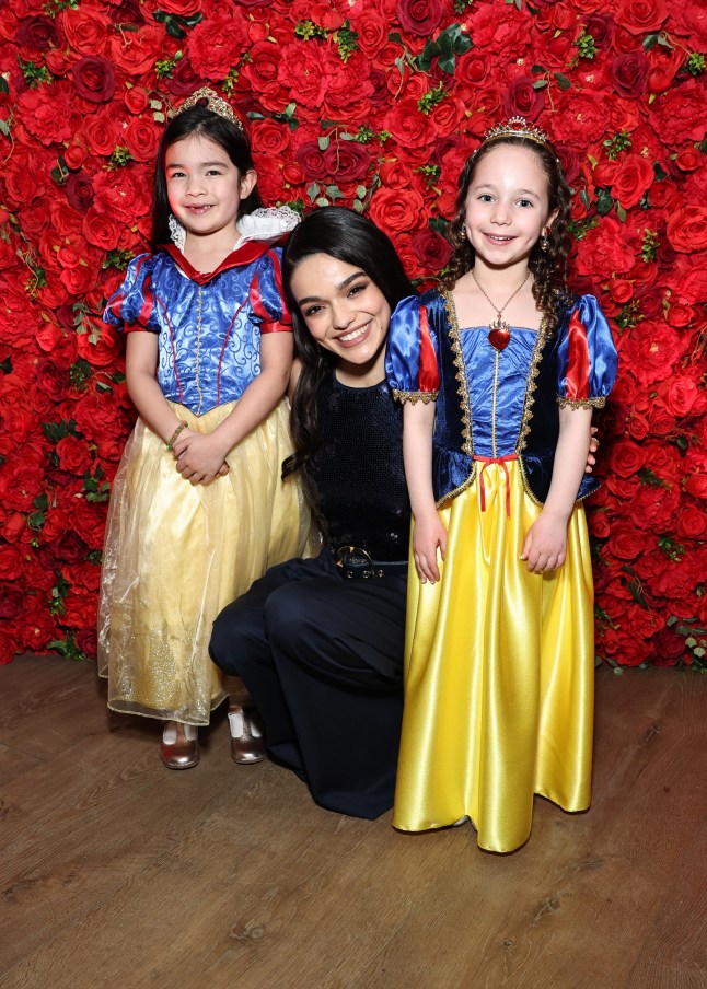 NEW YORK, NEW YORK - MARCH 20: Rachel Zegler (C) and guests attend the special screening of Disney's Snow White at The Whitby Hotel on March 20, 2025 in New York City. (Photo by Jamie McCarthy/Getty Images for Disney)