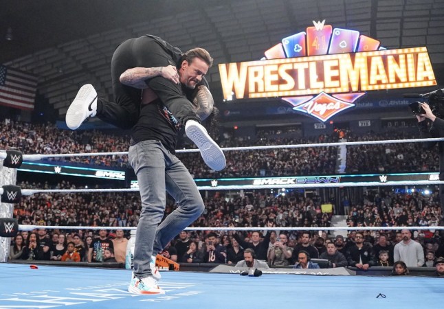 ROSEMONT, ILLINOIS - APRIL 4: CM Punk in action against Roman Reigns during SmackDown at Allstate Arena on April 4, 2025 in Rosemont, Illinois. (Photo by Heather McLaughlin/WWE via Getty Images)