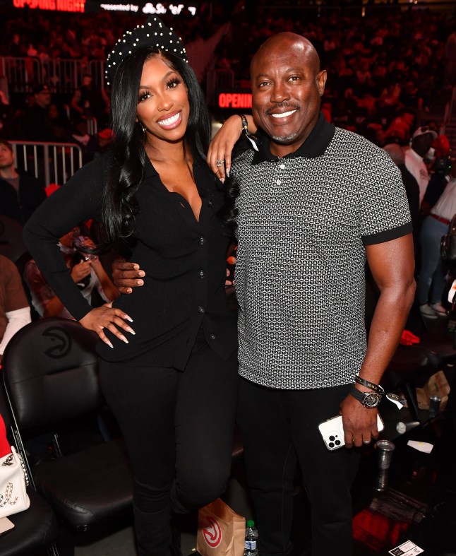 ATLANTA, GEORGIA - OCTOBER 19: Porsha Williams and Simon Guobadia attend the season home opener game between the Houston Rockets and the Atlanta Hawks at State Farm Arena on October 19, 2022 in Atlanta, Georgia. (Photo by Paras Griffin/Getty Images)