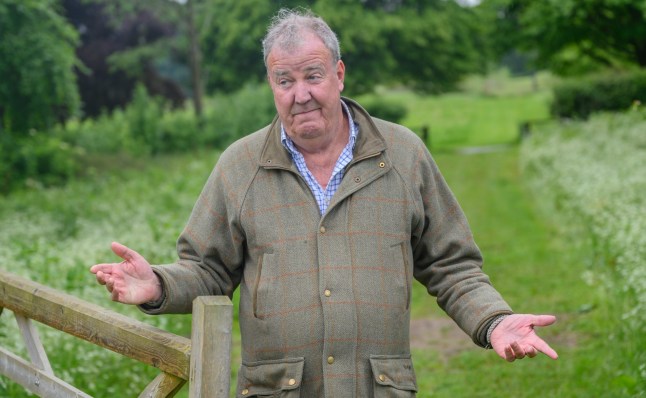 Jeremy Clarkson in a green coat stood outside on the grass