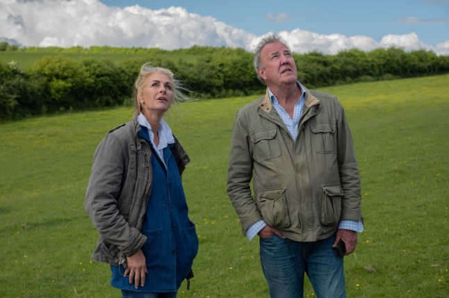 Jeremy Clarkson and wife Lisa stood in a field