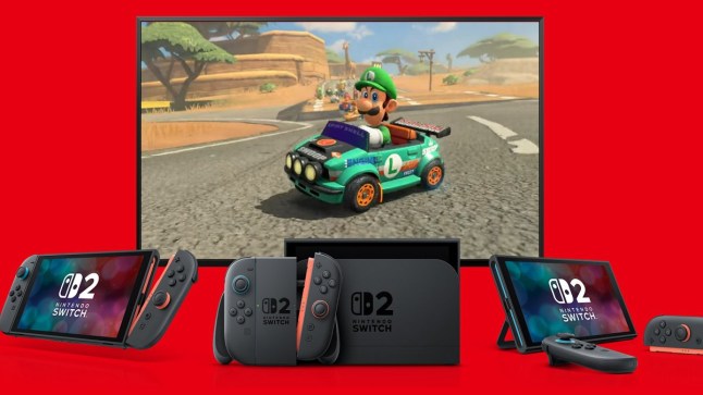 Three Nintendo Switch 2 consoles in handheld, docked, and undocked modes laid in a row in front of a TV displaying Luigi in Mario Kart World