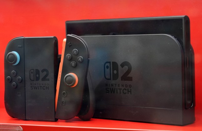 Photo of a Nintendo Switch 2 console, dock, and grip controller