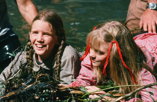 LITTLE HOUSE ON THE PRAIRIE -- "The Campout" Episode 9 -- Aired 11/19/1975 -- Pictured: (l-r) Melissa Gilbert as Laura Elizabeth Ingalls Wilder, Alison Arngrim as Nellie Oleson -- Photo by: NBCU Photo Bank
