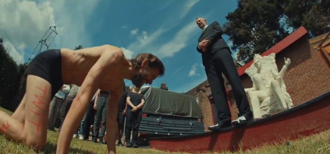 Mathew Baynton crawling towards Alex Horne in his underwear