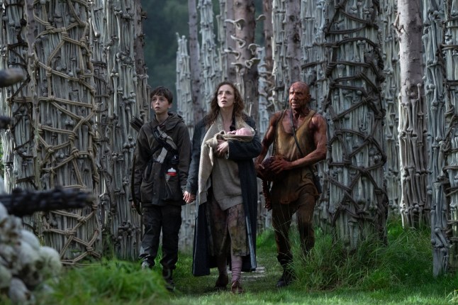 Undated film still from 28 Years Later. Pictured: Alfie Williams as Spike, Jodie Comer as Isla and Ralph Fiennes as Dr Kelson. See PA Feature SHOWBIZ Film Reviews. WARNING: This picture must only be used to accompany PA Feature SHOWBIZ Film Reviews. PA Photo. Picture credit should read: Sony Pictures Entertainment Inc./Miya Mizuno. All Rights Reserved. NOTE TO EDITORS: This picture must only be used to accompany PA Feature SHOWBIZ Film Reviews.