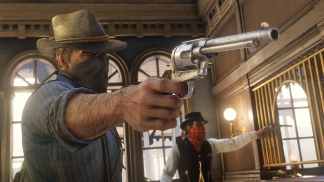Arthur Morgan and Dutch van der Linde in Red Dead Redemption 2 robbing a building